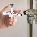 clé en croix d'électricien et sanitaire.webp